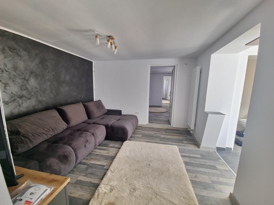 Casa individuala 3 camere foisor acoperit curte km 4