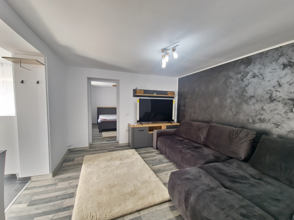 Casa individuala 3 camere foisor acoperit curte km 4