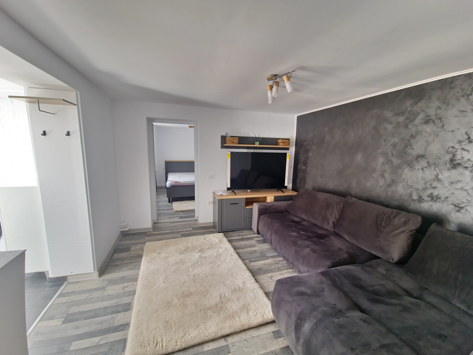 Casa individuala 3 camere foisor acoperit curte km 4