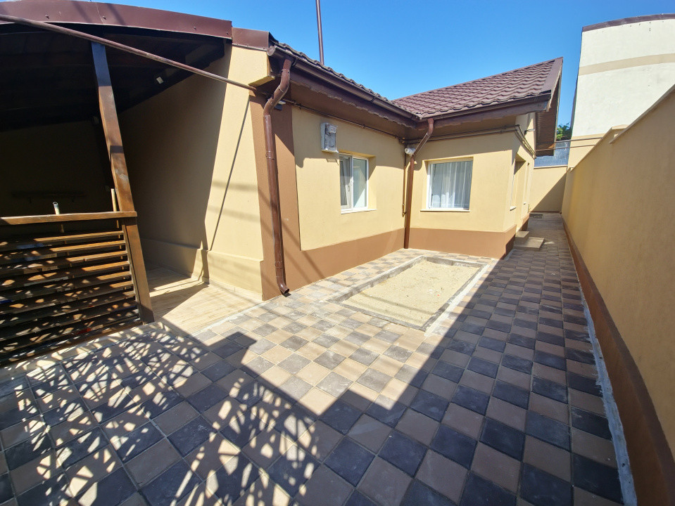 Casa individuala 3 camere foisor acoperit curte km 4