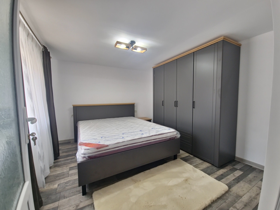 Casa individuala 3 camere foisor acoperit curte km 4