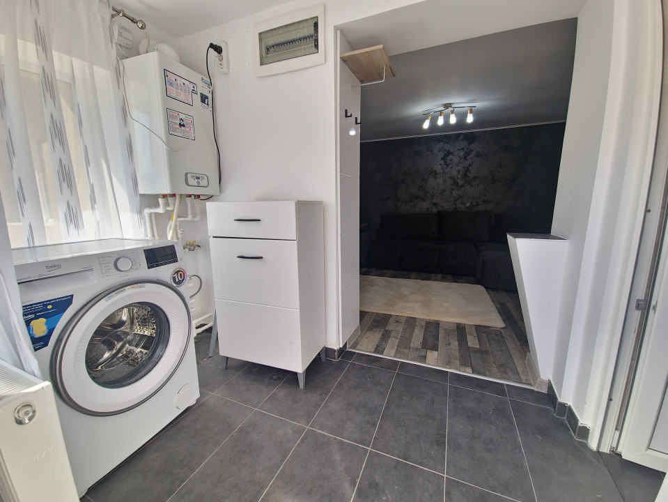 Casa individuala 3 camere foisor acoperit curte km 4