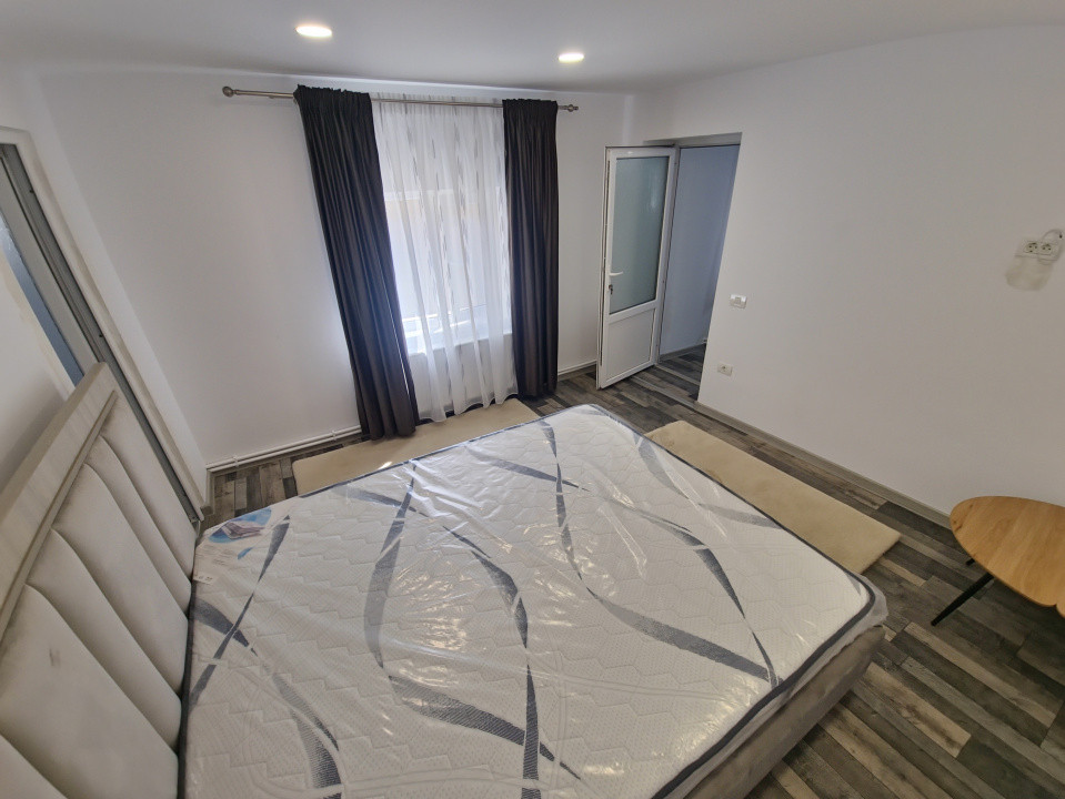 Casa individuala 3 camere foisor acoperit curte km 4