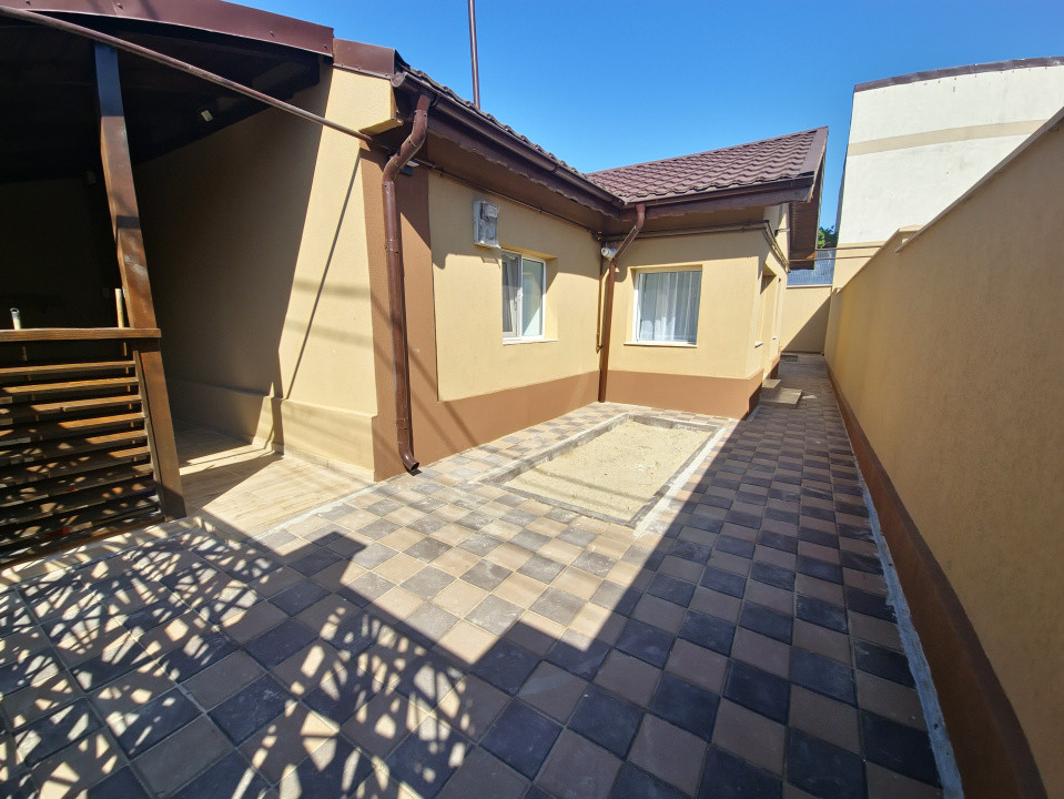 Casa individuala 3 camere foisor acoperit curte km 4