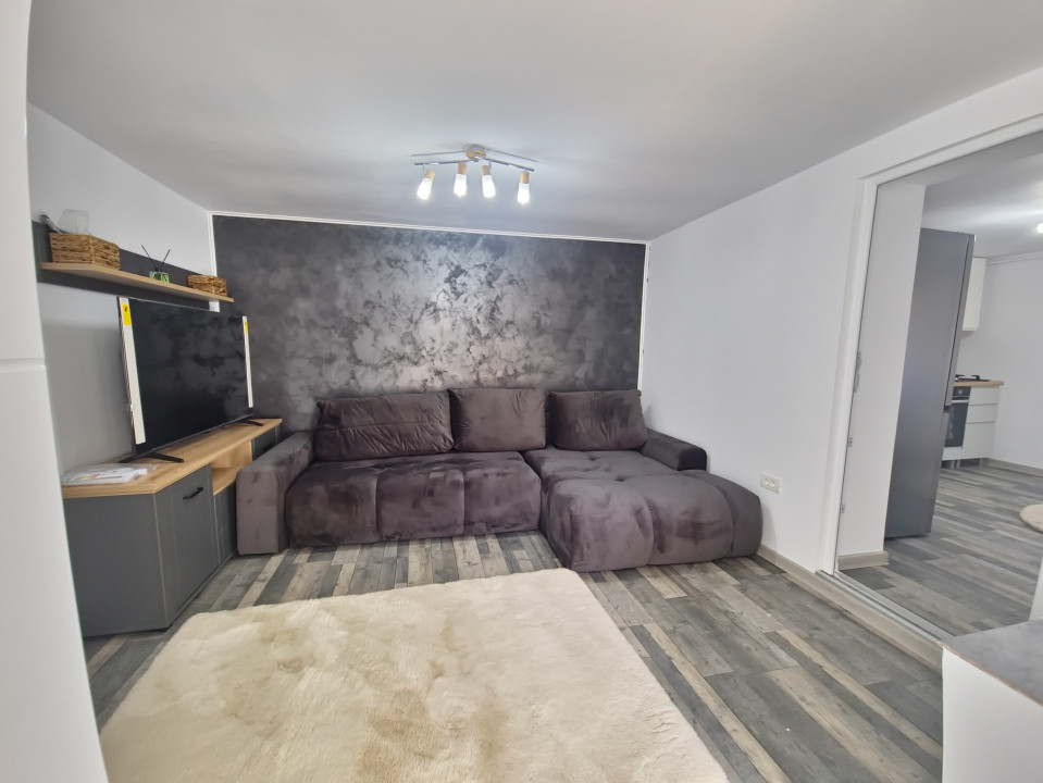 Casa individuala 3 camere foisor acoperit curte km 4