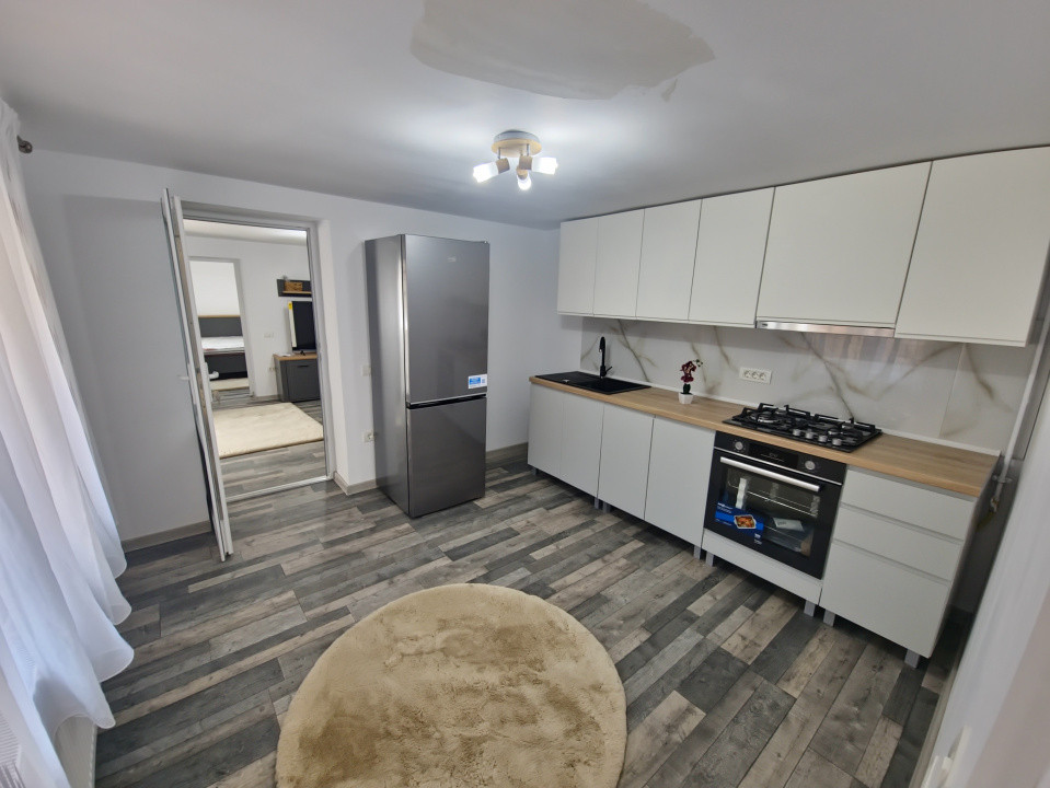 Casa individuala 3 camere foisor acoperit curte km 4