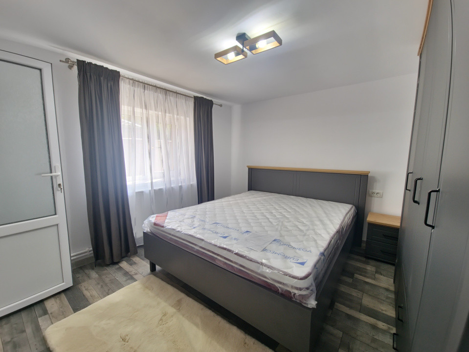 Casa individuala 3 camere foisor acoperit curte km 4