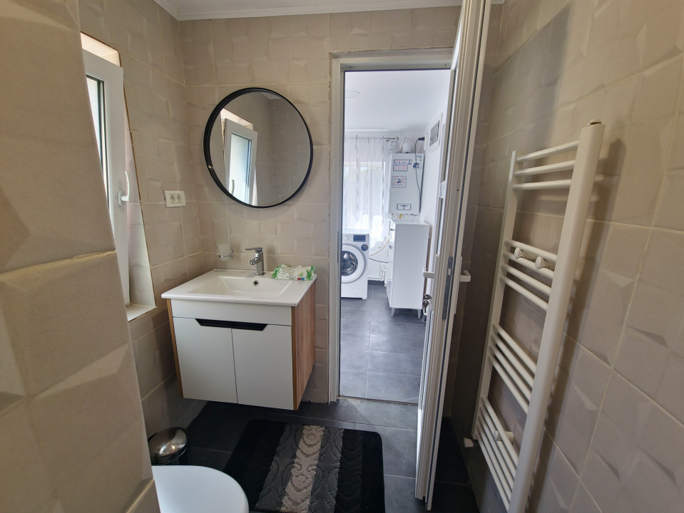 Casa individuala 3 camere foisor acoperit curte km 4