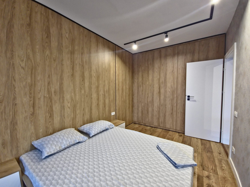 Dacia apartament 2 camere nou cu lift loc parcare subteran in pret