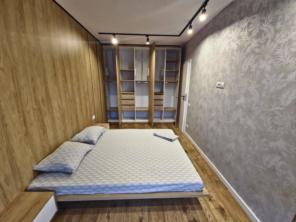 Dacia apartament 2 camere nou cu lift loc parcare subteran in pret