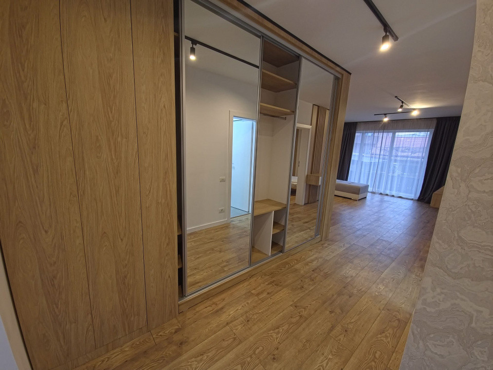 Dacia apartament 2 camere nou cu lift loc parcare subteran in pret