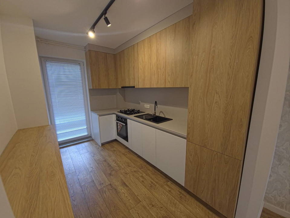 Dacia apartament 2 camere nou cu lift loc parcare subteran in pret