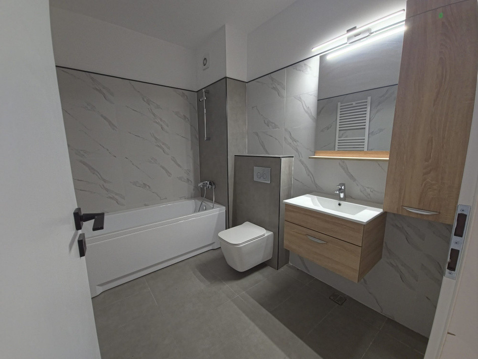 Dacia apartament 3 camere nou incalzire pardoseala loc parcare subteran